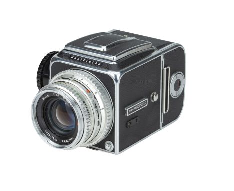 A Hasselblad 500C/M Medium Format Camera,1973, chrome, serial no. UP145876, with Carl Zeiss Planar T* f/2.8 80mm lens, chrome