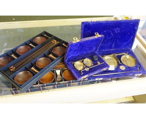 CASED SCALES. Two sets of cased scales and Oriental saki sets