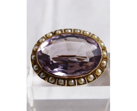 SEED PEARL BROOCH. Vintage seed pearl and amethyst brooch, presumed gold