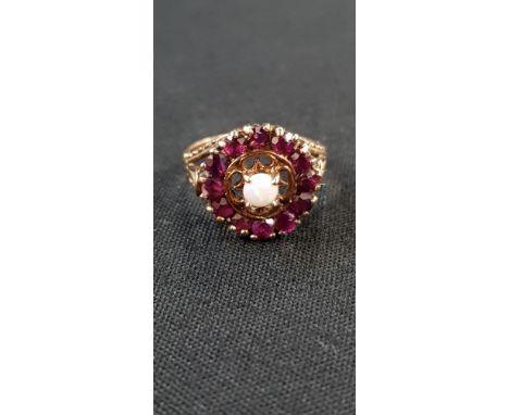 9CT GOLD GARNET AND OPAL RING