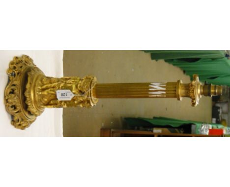 Cast gilt metal Corinthian column table lamp with cherub figure supports.