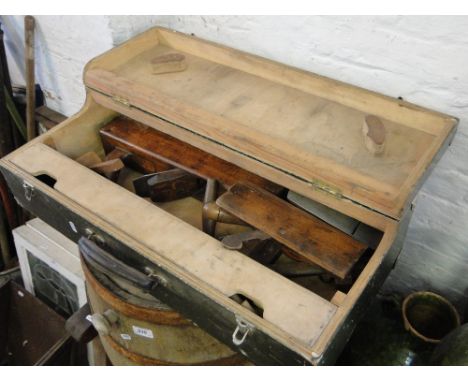 A green pine carpenter's tool box and contents.