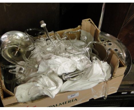A Chrome ceiling light fitting with glass fitments