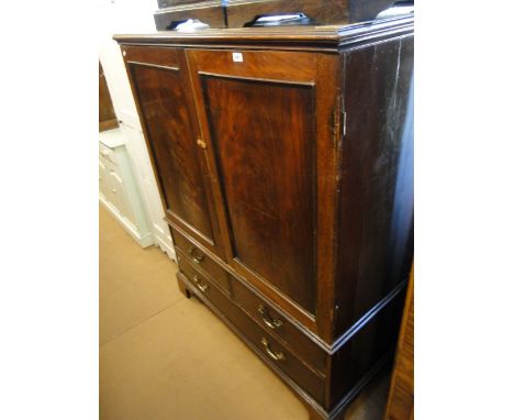 A 19th century mahogany dwarf linen press, 2 panelled doors revealing a 5 slide fitted interior, the base fitted with 2 short