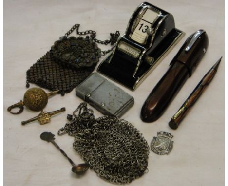 Vintage perpetual calendar, a purse, cigarette lighter, etc.