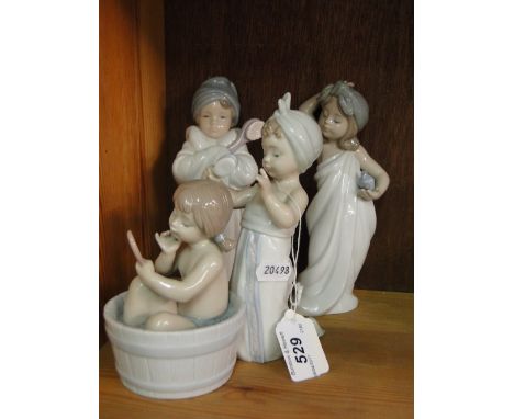 A Lladro "Bathtime" group and 2 Lladro children at bathtime figures, (3).