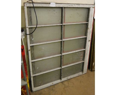 Pair of vintage painted pine and sliding glass shutters