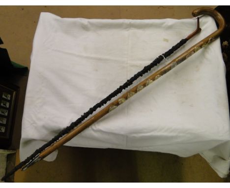 An Alpenstock & a carved walking stick