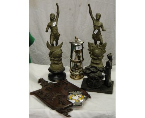 Pair of spelter figures, a Miner's lamp, AA badge, carved wood shield (Earl of Oxford's House of Lords locker plate) and an I