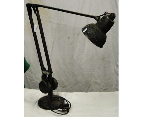 An early angle-poise lamp.