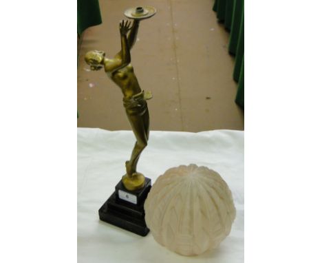 An Art Deco style gilded spelter dancing girl table lamp, with moulded pink shade