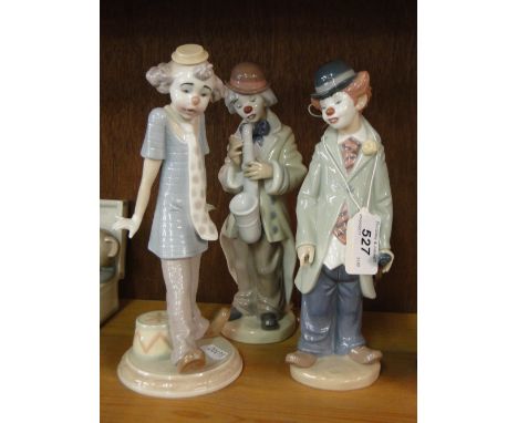 3 Lladro clown figures.