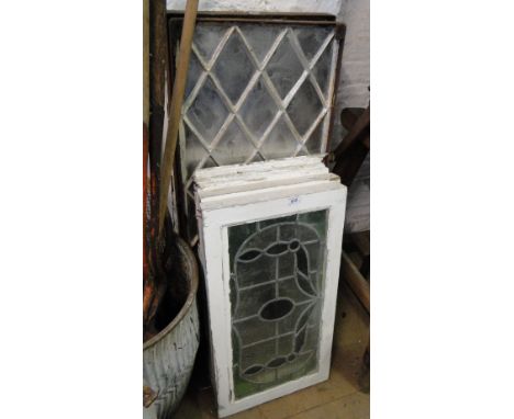 3 Coloured lead light glazed window panels, and a pair of metal framed window panels.