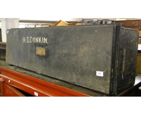 A late Victorian military campaign canvas wash basin in a metal trunk, with brass plaque W J Levi Esq., Lieut. Bucks Yeomanry