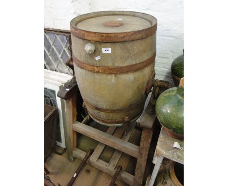 A Vintage coopered oak butter churn on pine stand.