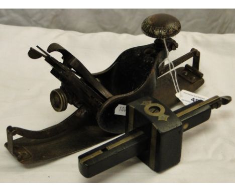 A compass plane by The Stanley Rule & Level Co., and a brass mounted mortice gauge.