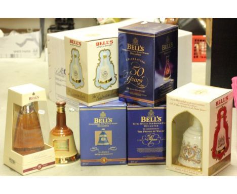 Six Boxed Wade Bells Whiskey Bells (full) together with one loose