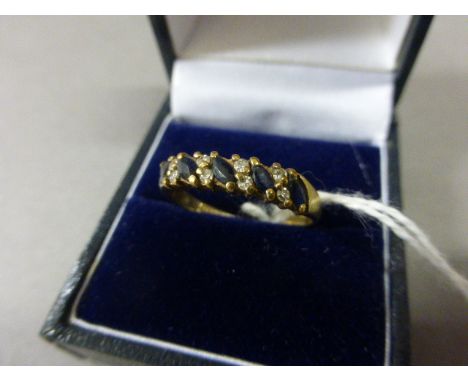 9ct Gold Ring set with Five Sapphires and interset with Diamonds