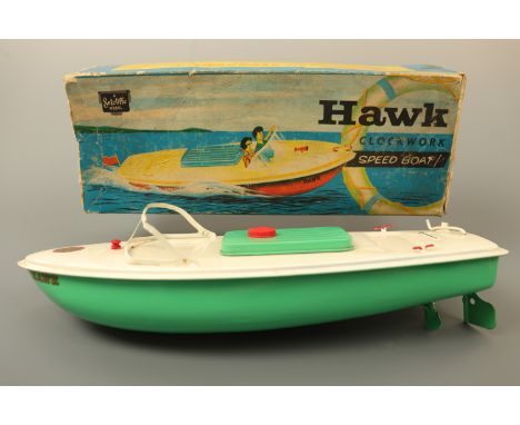 A Sutcliffe Model "Hawk" clockwork tinplate speed boat, in original carton