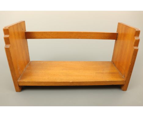 A wooden book trough, 35 × 13 × 19 cm
