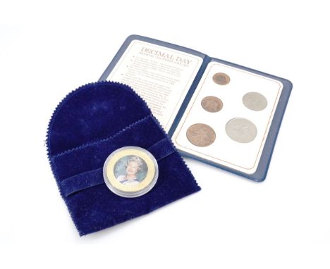 A Jersey 2012 Diamond Jubilee commemorative Fifty Pence and a wallet containing "Britain's First Decimal Coins"
