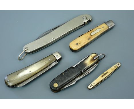 Vintage pocket folding knives including an Inoxid tool knife with horn grip scales