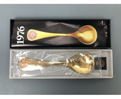 A Georg Jensen 1976 enamelled and gilt Sterling white metal year spoon, sealed and boxed with paperwork