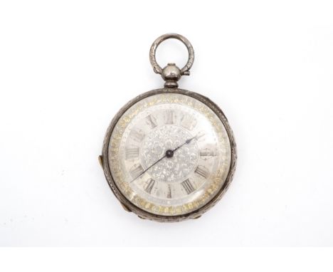 A late Victorian white metal pocket or fob watch, having a Swiss key-wound movement with engraved face, 4 cm excluding stem a