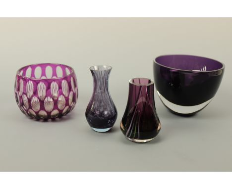 A cased amethyst glass bowl and three other items of amethyst glass