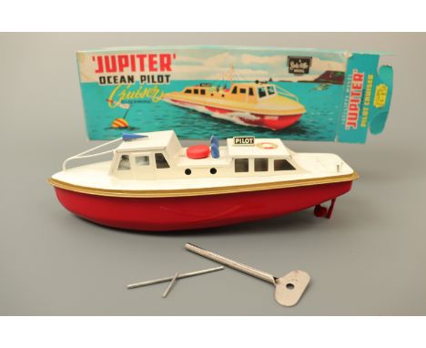 A Sutcliffe Model "Jupiter Ocean Pilot Cruiser" tinplate toy boat, in original carton