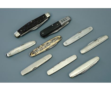 A quantity of vintage pocket folding knives including a Wolstenholm IXL knife and another from Eskilstuna with Viking influen