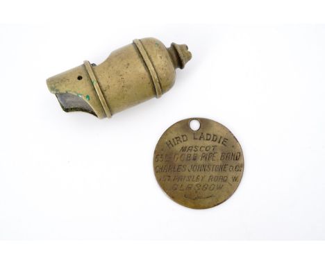 An early-to-mid 20th Century dog collar tag, engraved "Hird Laddie, Mascot, 53rd GCBB Pipe Band, Charles Johnstone OC, 157 Pa