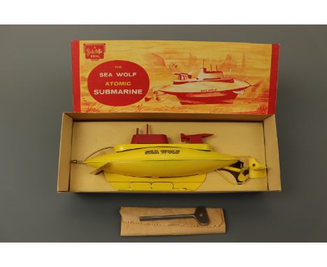 A Sutcliffe Model "Sea Wolf Atomic Submarine" tinplate clockwork toy, in original carton