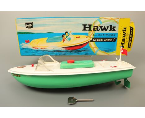 A Sutcliffe Model "Hawk" clockwork tinplate speed boat, in original carton