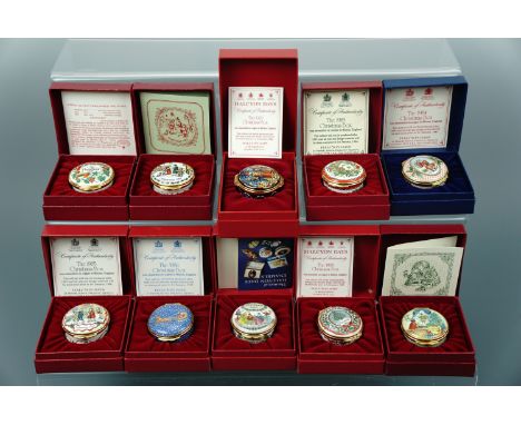 Ten Halcyon Days enamel Christmas boxes, 1980 - 1989, boxed with documents