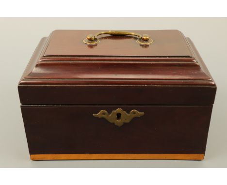 A George III mahogany tea caddy, with satinwood inlay, opening to reveal two covered compartments, 22 x 14 x 14 cm high