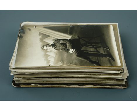 A quantity of largely Great War military photographic portrait postcards