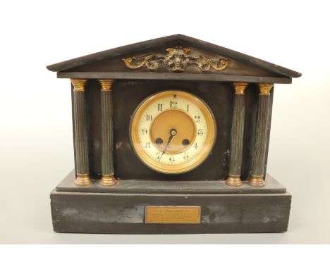 A Victorian polished slate and marble mantle clock with presentation plaque, (replacement quartz movement), 26 cm high