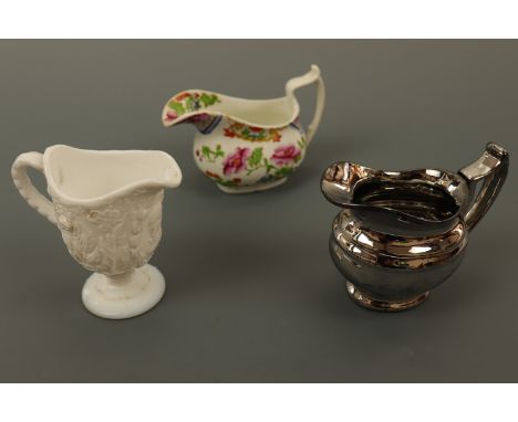 Three 19th Century jugs, including a pressed milk-glass commemorative jug depicting a portrait of Prime Minister Benjamin Dis