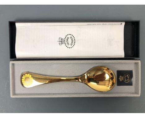 A Georg Jensen 1973 enamelled and gilt Sterling white metal year spoon, boxed with paperwork