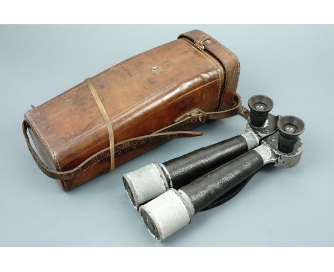 An Imperial Japanese army binocular periscope and case, 10 x 4°, maker-marked KH within a lozenge, the leather case bearing J