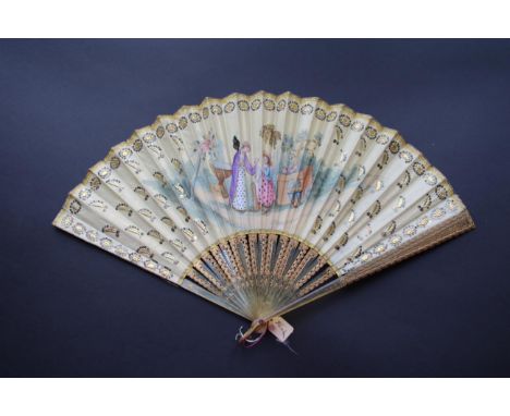 An Early 19th Century Horn Fan, with a double silk leaf, the guards incised with a curly or perhaps feather design, flanking 