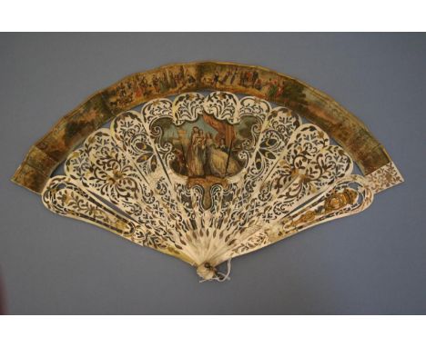 A Large Mid-19th Century Mother-of-Pearl Fan in the Spanish style, the sticks very heavy and wide, gilded, the leaf very slim