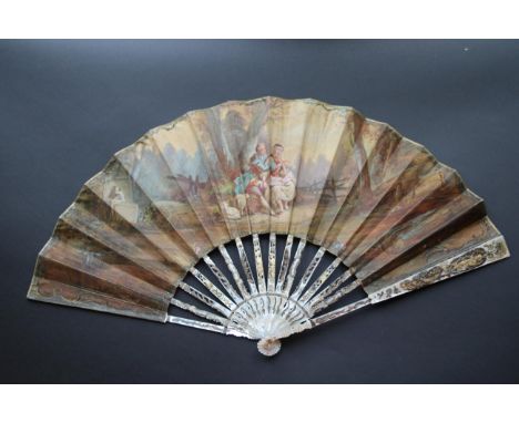 Sharing a Picnic: A Mid-18th Century Mother-of-Pearl Fan, the monture carved and pierced, silvered and gilded. The guards eac