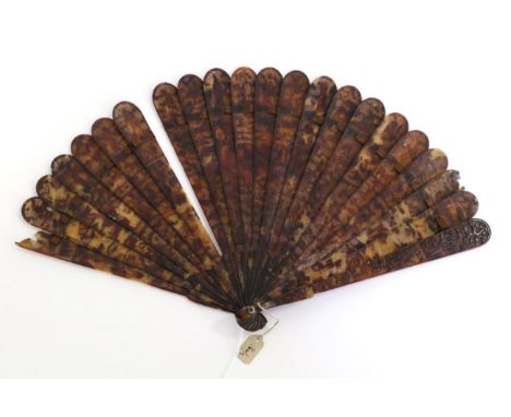 A Circa 1840's Chinese Carved Tortoiseshell Brisé Fan, Qing Dynasty, with plain central vignette for a monogram, the twenty i