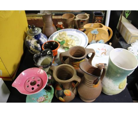 Collection of mostly Art Deco jugs and vases, some with brightly coloured decoration, a Royal Doulton 'Persian Spray; teapot 