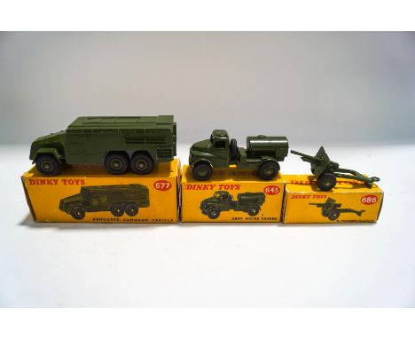 A Dinky 677 Armoured command vehicle, boxed, a 643 Army water tanker, boxed and a 686 25-Pounder Field gun boxed