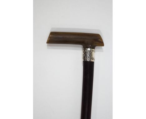 A mahogany shafted walking stick with horn handle and 1" wide 1896 Birmingham silver collar