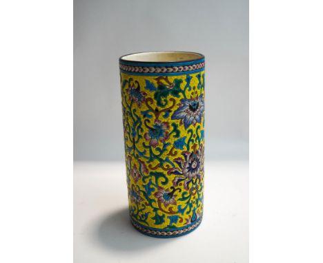 A French Longwy cylindrical vase, with all over enamel decoration of stylised flowers, 25cm high