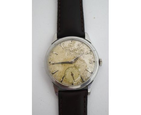 Omega, a gentleman's stainless steel manual wind wrist watch, the round dial with steel coloured dagger batons and Arabic qua